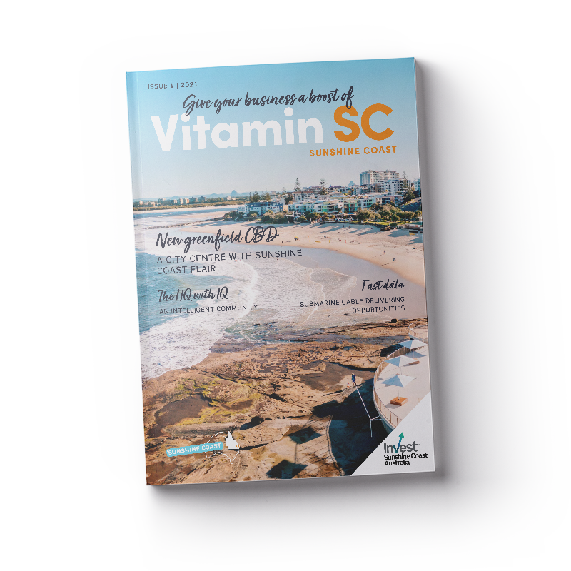 Image of a magazine with the title Vitamin SC Sunshine Coast and an image of a beautiful beach on a sunny day.
